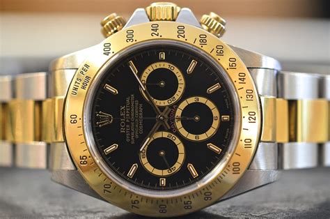 rolex daytona acciaio oro quadrante nero|Orologio Rolex Cosmograph Daytona in acciaio Oystersteel.